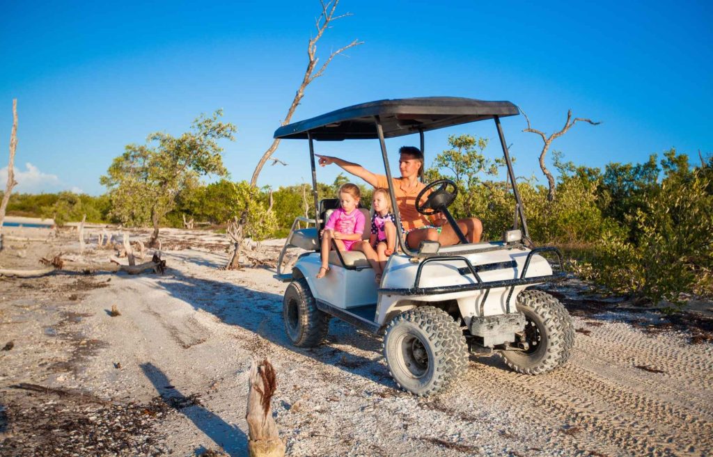 Visiter Holbox en voiturette de golf