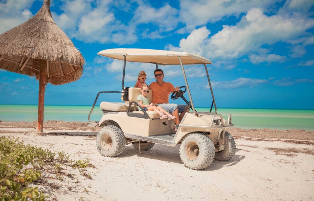 Visiter Holbox en voiturette de golf